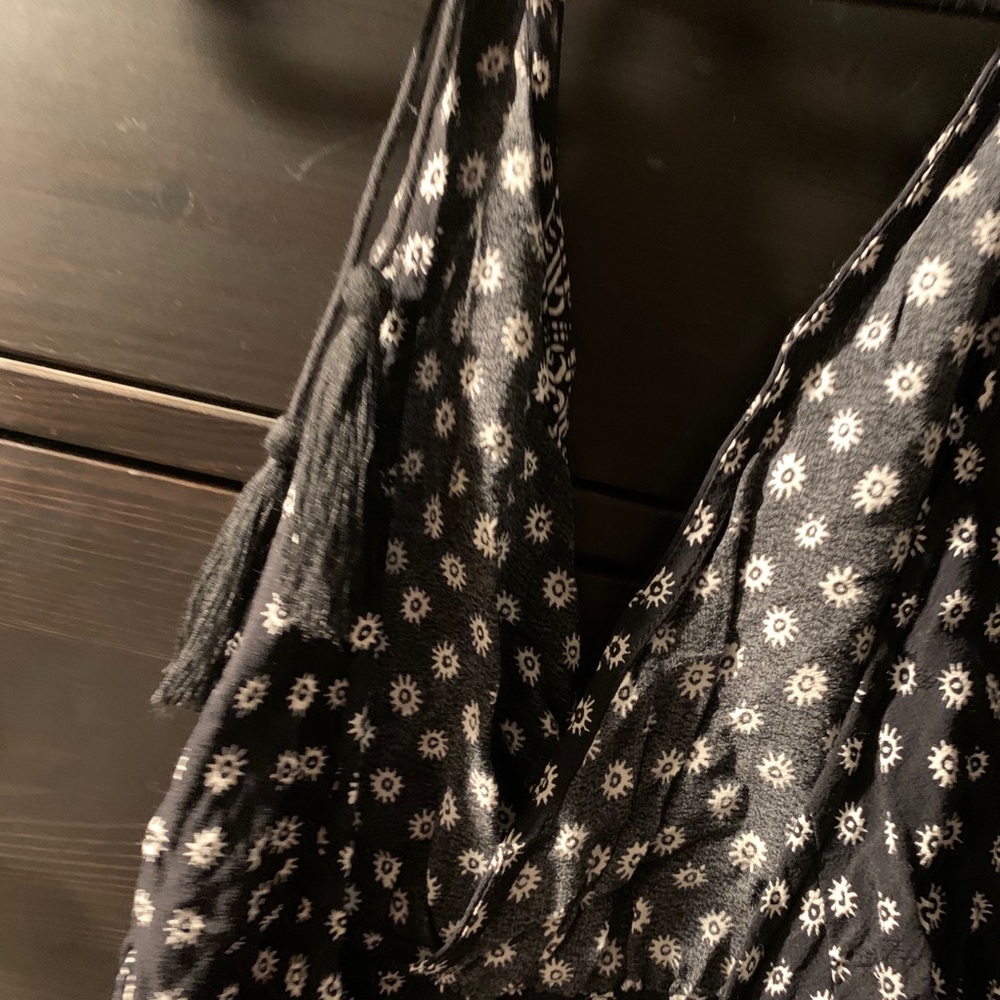 Olivaceous Black and White Halter Floral Patterned Romper - Picture 6 of 9